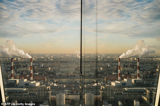 A view of the city of Moscow through a reflection in a mirror wall of the Federation Tower of Moscow