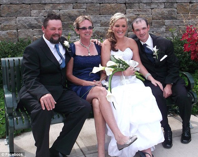 Huntley, pictured on his wedding day with wife Samantha, her mother and the mom