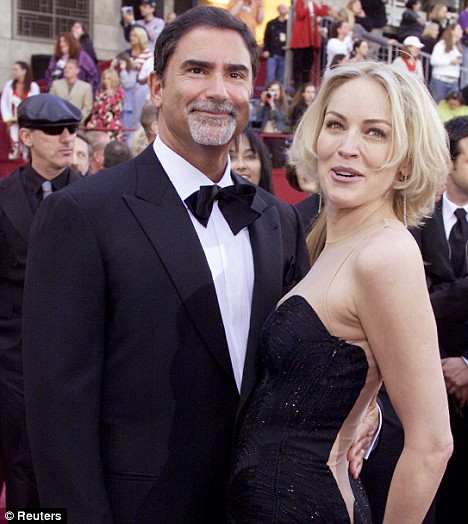 Sharon Stone and her husband Phil Bronstein arrive at the 74th annual Academy Awards in Hollywood, March 24, 2002.