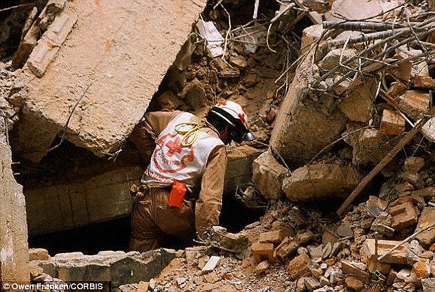The technology could eventually lead to the insects being used as surveillance drones or manoeuvred into risky locations such as disaster zones and collapsed buildings (pictured) instead of putting human lives at risk