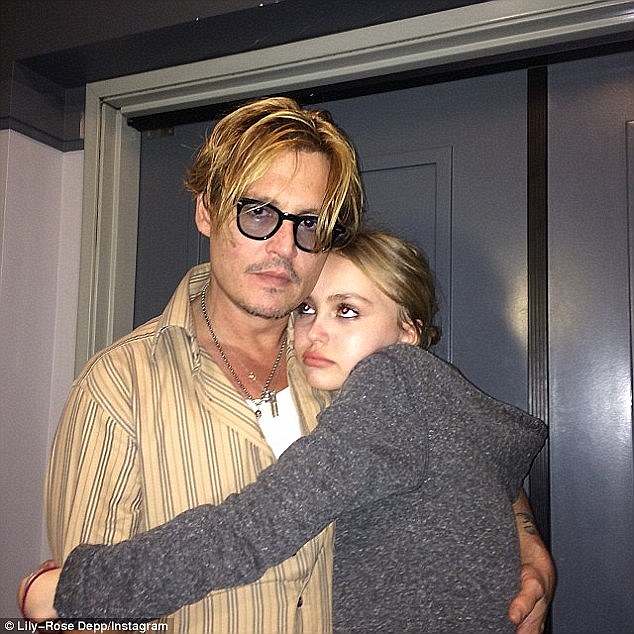 Devoted father: Johnny Depp has revealed the