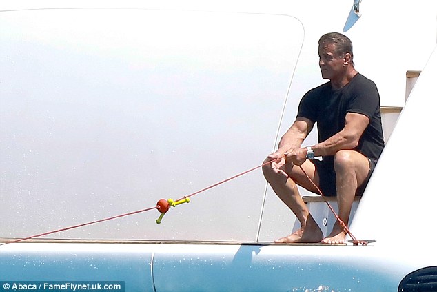 Manly: Sylvester looked every inch the action hero as he got stuck into working on the boat