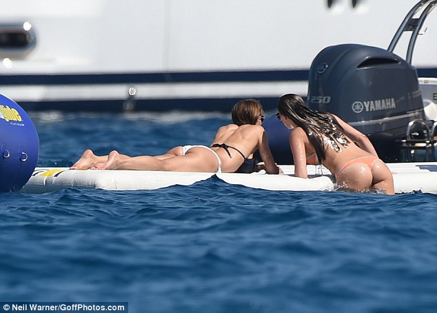 Gossip time: She caught up with her mother as they relaxed on a paddle-board 