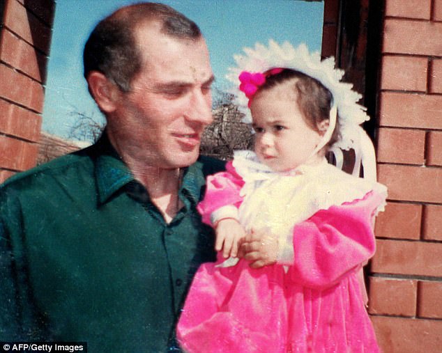 A heartbreaking family album photo shows Vitaly Kaloyev and his daugther Diana near their home in Vladikavkaz, Russia